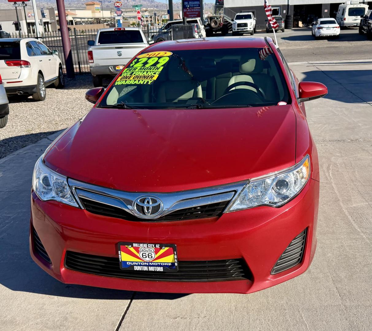 2012 Red Toyota Camry SE (4T4BF1FK7CR) with an 2.5L L4 DOHC 16V engine, 6-Speed Automatic transmission, located at 2190 Hwy 95, Bullhead City, AZ, 86442, (928) 704-0060, 0.000000, 0.000000 - Photo#1