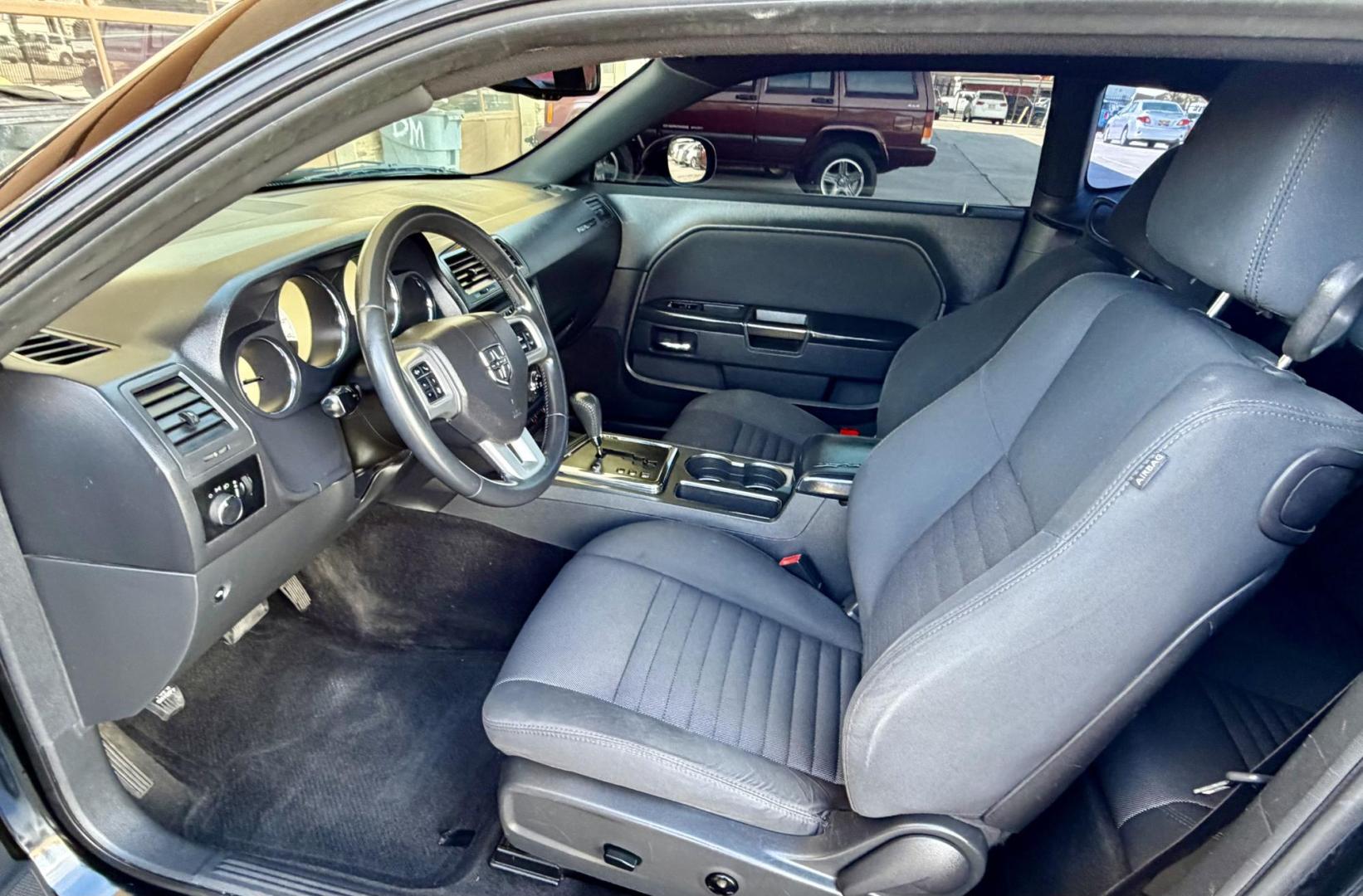 2011 Black Dodge Challenger SE (2B3CJ4DG0BH) with an 3.6L V6 DOHC 24V engine, 4-Speed Automatic transmission, located at 2190 Hwy 95, Bullhead City, AZ, 86442, (928) 704-0060, 0.000000, 0.000000 - Brand new tires. Free warranty. IN house financing available. - Photo#11