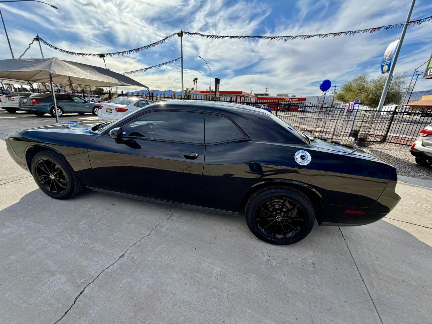 2011 Black Dodge Challenger SE (2B3CJ4DG0BH) with an 3.6L V6 DOHC 24V engine, 4-Speed Automatic transmission, located at 2190 Hwy 95, Bullhead City, AZ, 86442, (928) 704-0060, 0.000000, 0.000000 - Brand new tires. Free warranty. IN house financing available. - Photo#4