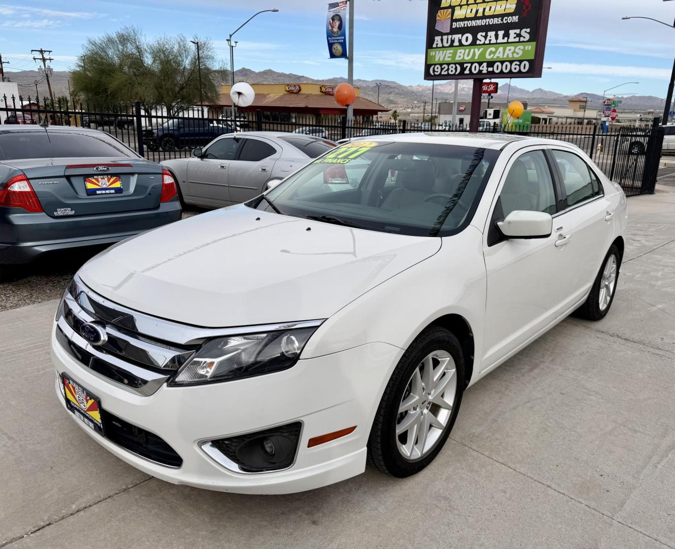 2012 White Ford Fusion SEL (3FAHP0JG6CR) with an 3.0L V6 DOHC 24V engine, located at 2190 Hwy 95, Bullhead City, AZ, 86442, (928) 704-0060, 0.000000, 0.000000 - Photo#2