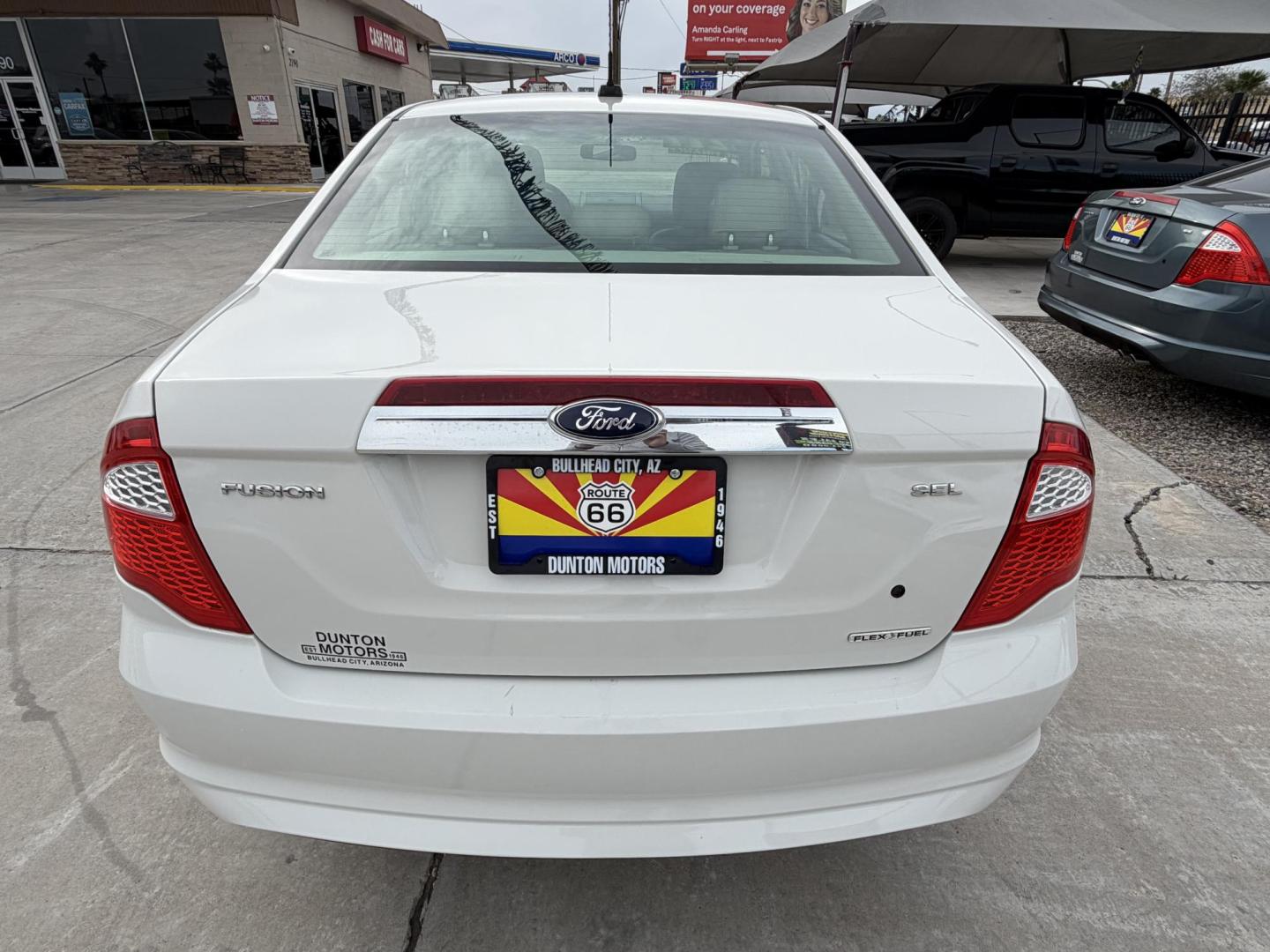 2012 White Ford Fusion SEL (3FAHP0JG6CR) with an 3.0L V6 DOHC 24V engine, located at 2190 Hwy 95, Bullhead City, AZ, 86442, (928) 704-0060, 0.000000, 0.000000 - Photo#3