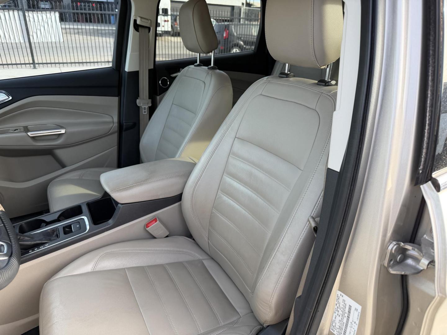 2018 Bronze /Grey Ford Escape Titanium FWD (1FMCU0J96JU) with an 2.0L L4 DOHC 16V engine, 6A transmission, located at 2190 Hwy 95, Bullhead City, AZ, 86442, (928) 704-0060, 0.000000, 0.000000 - 2018 Ford Escape Titanium. Leather, loaded. super clean. bluetooth, backup camera, top of the line. . free warranty. free carfax. we finance. in house financing. - Photo#3