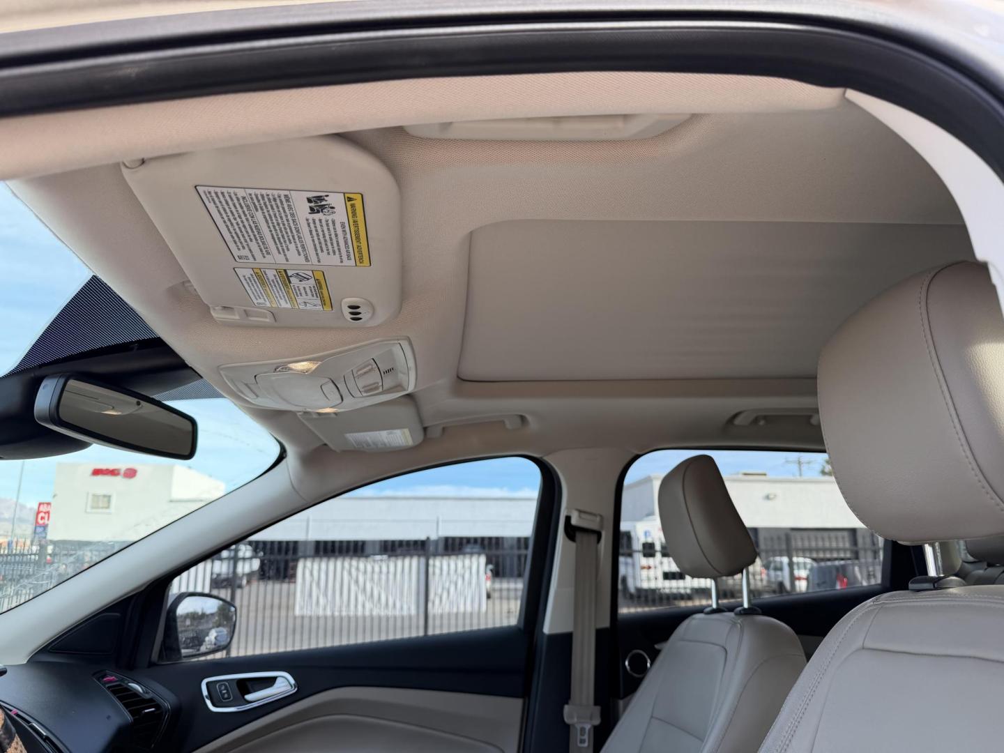 2018 Bronze /Grey Ford Escape Titanium FWD (1FMCU0J96JU) with an 2.0L L4 DOHC 16V engine, 6A transmission, located at 2190 Hwy 95, Bullhead City, AZ, 86442, (928) 704-0060, 0.000000, 0.000000 - 2018 Ford Escape Titanium. Leather, loaded. super clean. bluetooth, backup camera, top of the line. . free warranty. free carfax. we finance. in house financing. - Photo#4