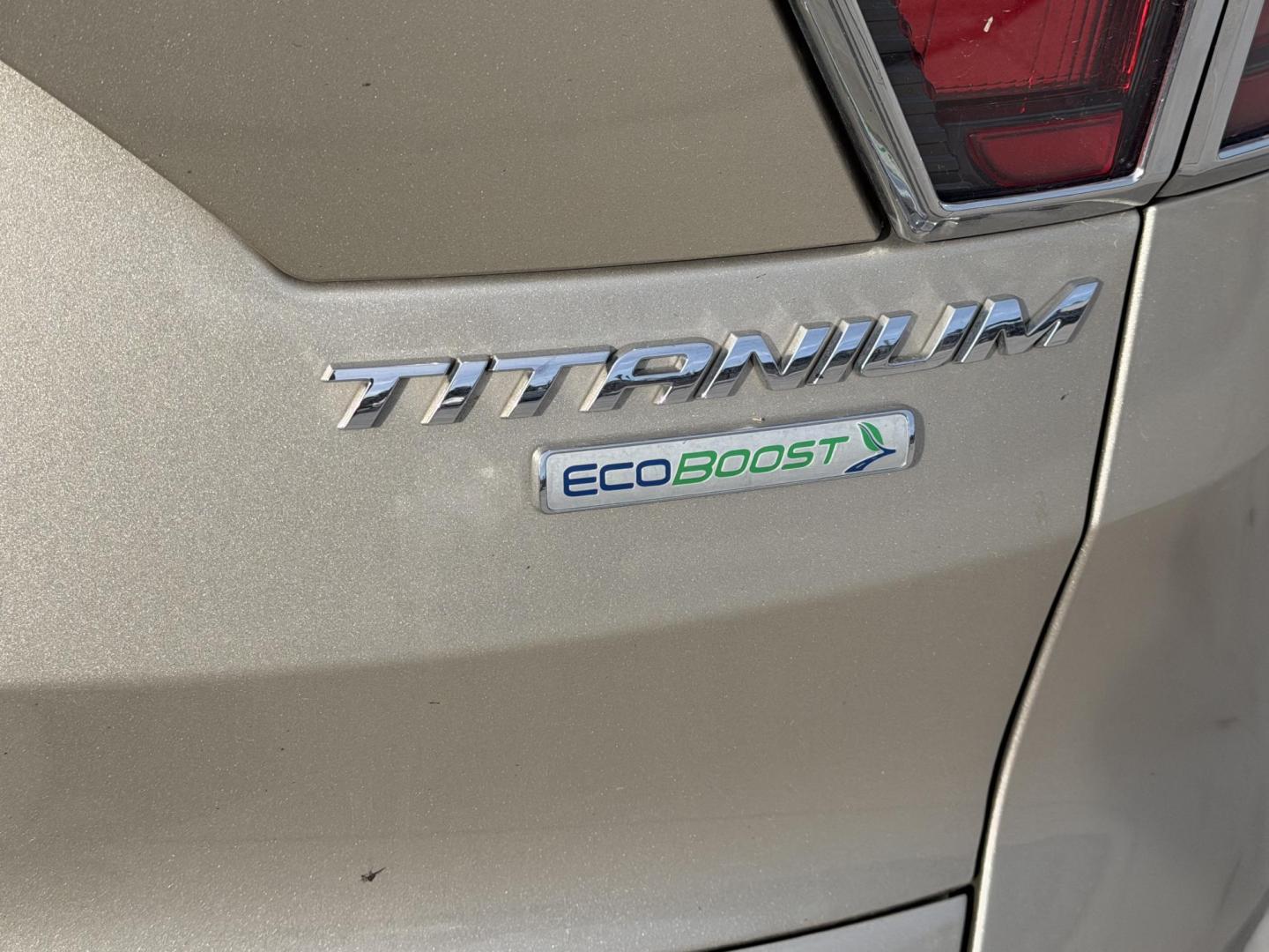 2018 Bronze /Grey Ford Escape Titanium FWD (1FMCU0J96JU) with an 2.0L L4 DOHC 16V engine, 6A transmission, located at 2190 Hwy 95, Bullhead City, AZ, 86442, (928) 704-0060, 0.000000, 0.000000 - 2018 Ford Escape Titanium. Leather, loaded. super clean. bluetooth, backup camera, top of the line. . free warranty. free carfax. we finance. in house financing. - Photo#6