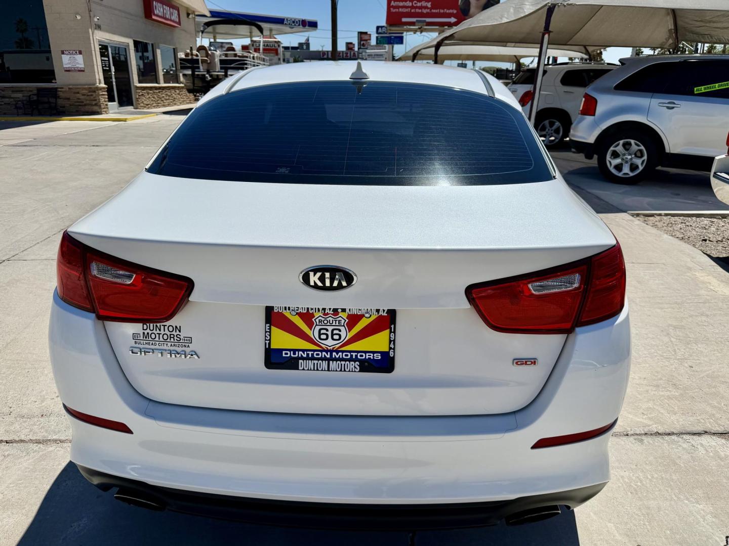 2015 White Kia Optima LX (KNAGM4A75F5) with an 2.4L L4 DOHC 16V engine, 6-Speed Automatic transmission, located at 2190 Hwy 95, Bullhead City, AZ, 86442, (928) 704-0060, 0.000000, 0.000000 - Photo#1