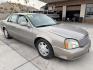 2003 Bronze Cadillac Deville Sedan (1G6KD54Y83U) with an 4.6L V8 DOHC 32V engine, 4-Speed Automatic Overdrive transmission, located at 2190 Hwy 95, Bullhead City, AZ, 86442, (928) 704-0060, 0.000000, 0.000000 - Photo#1