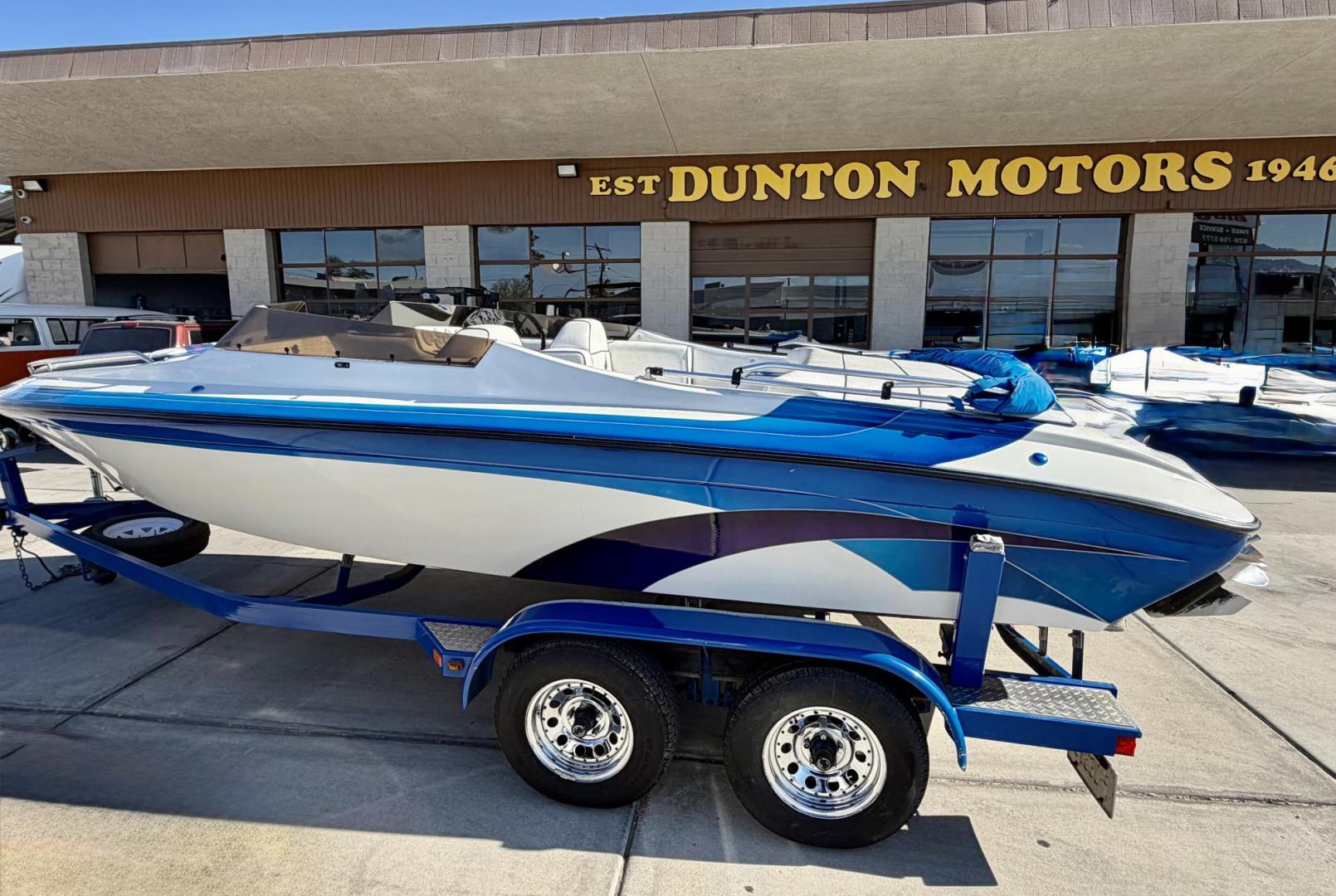 2001 White /white/blue Galaxie Starion 2150 , located at 2190 Hwy 95, Bullhead City, AZ, 86442, (928) 704-0060, 0.000000, 0.000000 - On consignment. This super clean 2001 Galaxie Starion 2150 boat. 5.7 V8 engine. 1 owner. only 248 hours. Always garaged since new. Just serviced. trailer included. Alpha 1 outdirve. spacious seaing layout. bimini top . swim platform stereo. upholstery in great shape. always maintained. Runs excellen - Photo#0