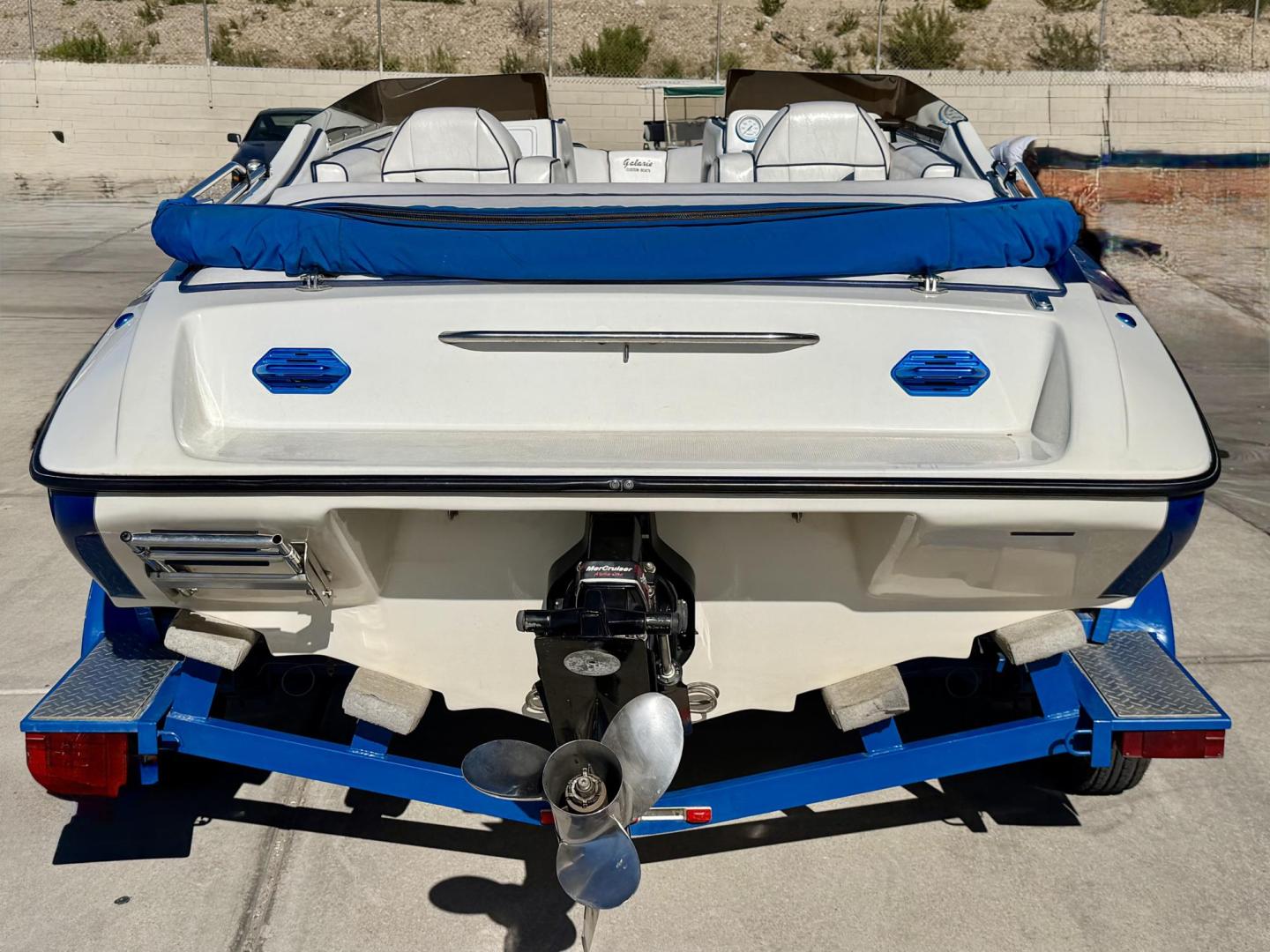 2001 White /white/blue Galaxie Starion 2150 , located at 2190 Hwy 95, Bullhead City, AZ, 86442, (928) 704-0060, 0.000000, 0.000000 - On consignment. This super clean 2001 Galaxie Starion 2150 boat. 5.7 V8 engine. 1 owner. only 248 hours. Always garaged since new. Just serviced. trailer included. Alpha 1 outdirve. spacious seaing layout. bimini top . swim platform stereo. upholstery in great shape. always maintained. Runs excellen - Photo#3