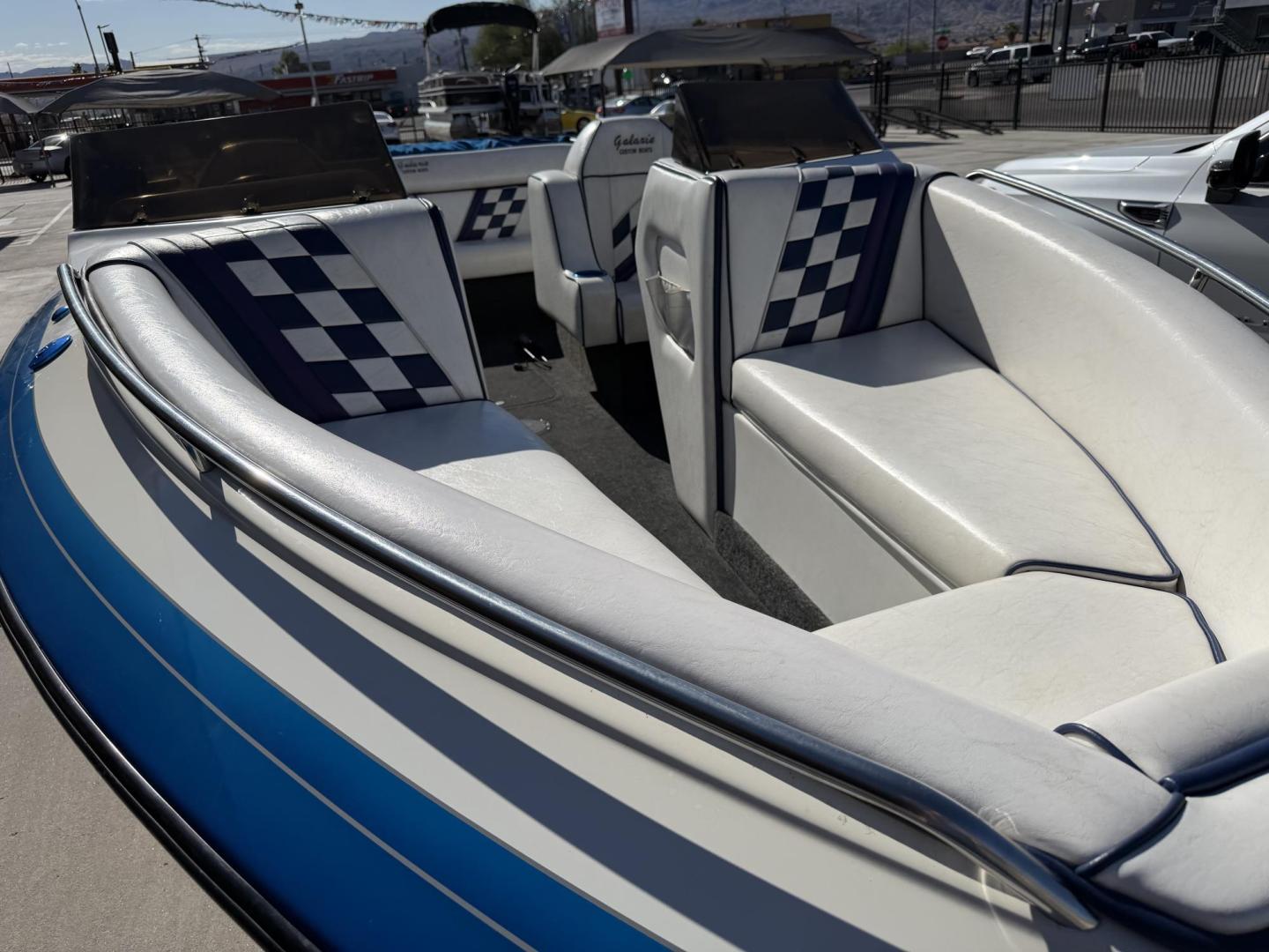 2001 White /white/blue Galaxie Starion 2150 , located at 2190 Hwy 95, Bullhead City, AZ, 86442, (928) 704-0060, 0.000000, 0.000000 - On consignment. This super clean 2001 Galaxie Starion 2150 boat. 5.7 V8 engine. 1 owner. only 248 hours. Always garaged since new. Just serviced. trailer included. Alpha 1 outdirve. spacious seaing layout. bimini top . swim platform stereo. upholstery in great shape. always maintained. Runs excellen - Photo#5