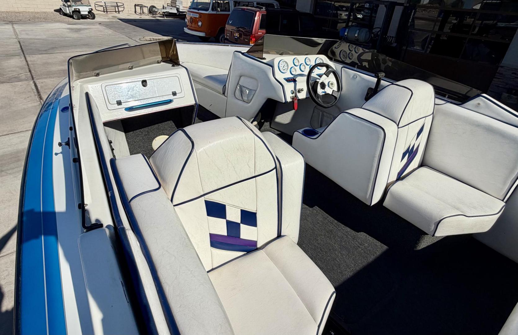 2001 White /white/blue Galaxie Starion 2150 , located at 2190 Hwy 95, Bullhead City, AZ, 86442, (928) 704-0060, 0.000000, 0.000000 - On consignment. This super clean 2001 Galaxie Starion 2150 boat. 5.7 V8 engine. 1 owner. only 248 hours. Always garaged since new. Just serviced. trailer included. Alpha 1 outdirve. spacious seaing layout. bimini top . swim platform stereo. upholstery in great shape. always maintained. Runs excellen - Photo#4