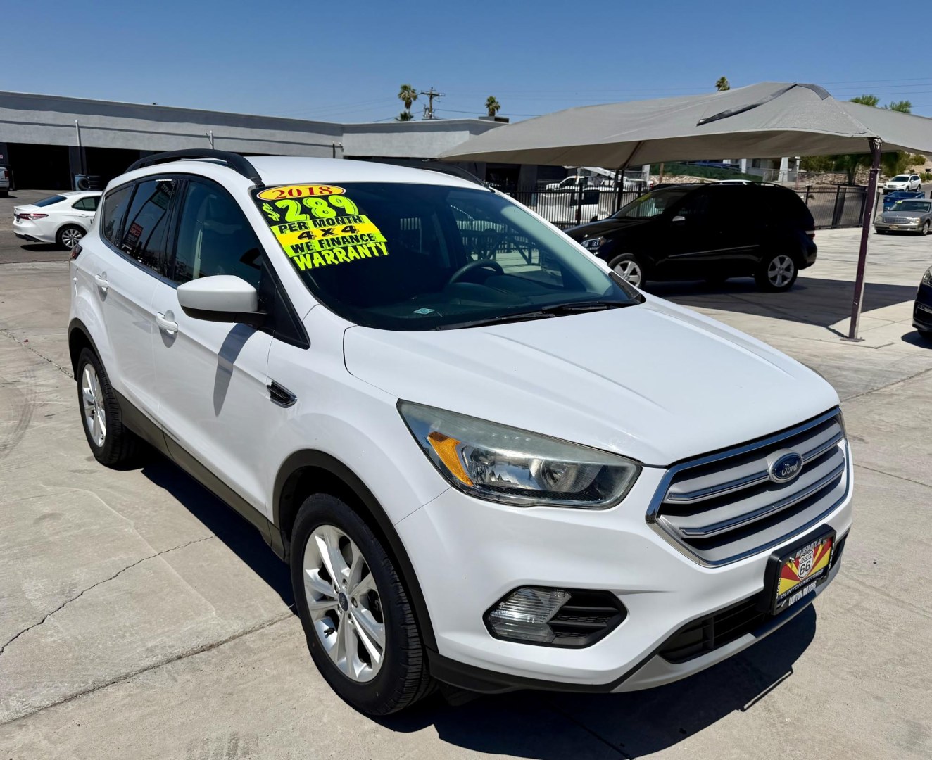 2018 White Ford Escape SE 4WD (1FMCU9GD2JU) with an 1.5L L4 DOHC 16V engine, 6A transmission, located at 2190 Hwy 95, Bullhead City, AZ, 86442, (928) 704-0060, 0.000000, 0.000000 - 2018 Ford Escape Se. 4 wheel drive. 1 owner. local Arizona car. Free carfax, free warranty. In house financing available. Runs and drives great.- Photo#3