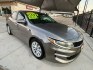 2017 Gold Kia Optima LX (5XXGT4L31HG) with an 2.4L L4 DOHC 16V engine, 6A transmission, located at 2190 Hwy 95, Bullhead City, AZ, 86442, (928) 704-0060, 0.000000, 0.000000- Photo#0