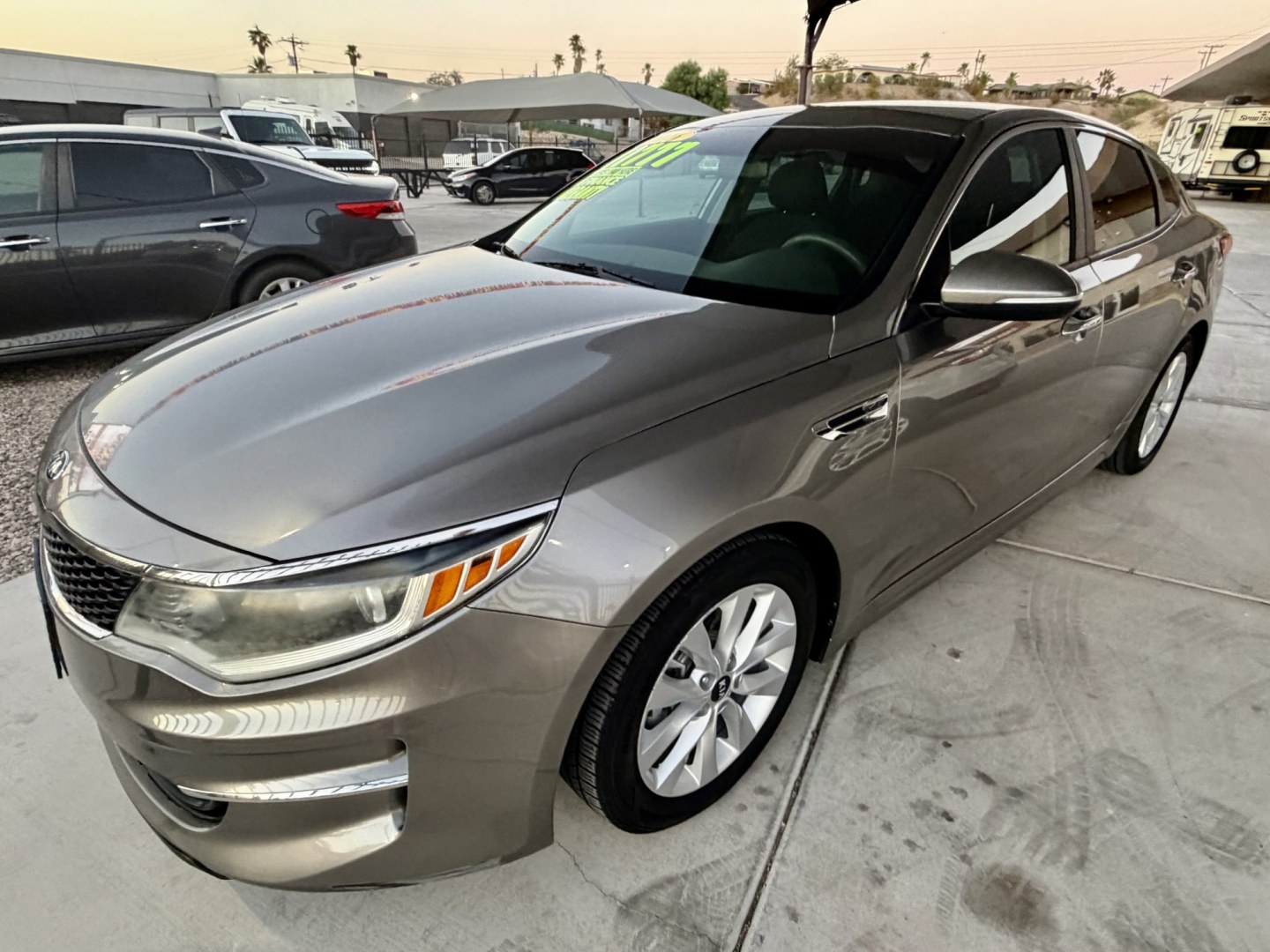 2017 Gold Kia Optima LX (5XXGT4L31HG) with an 2.4L L4 DOHC 16V engine, 6A transmission, located at 2190 Hwy 95, Bullhead City, AZ, 86442, (928) 704-0060, 0.000000, 0.000000- Photo#1