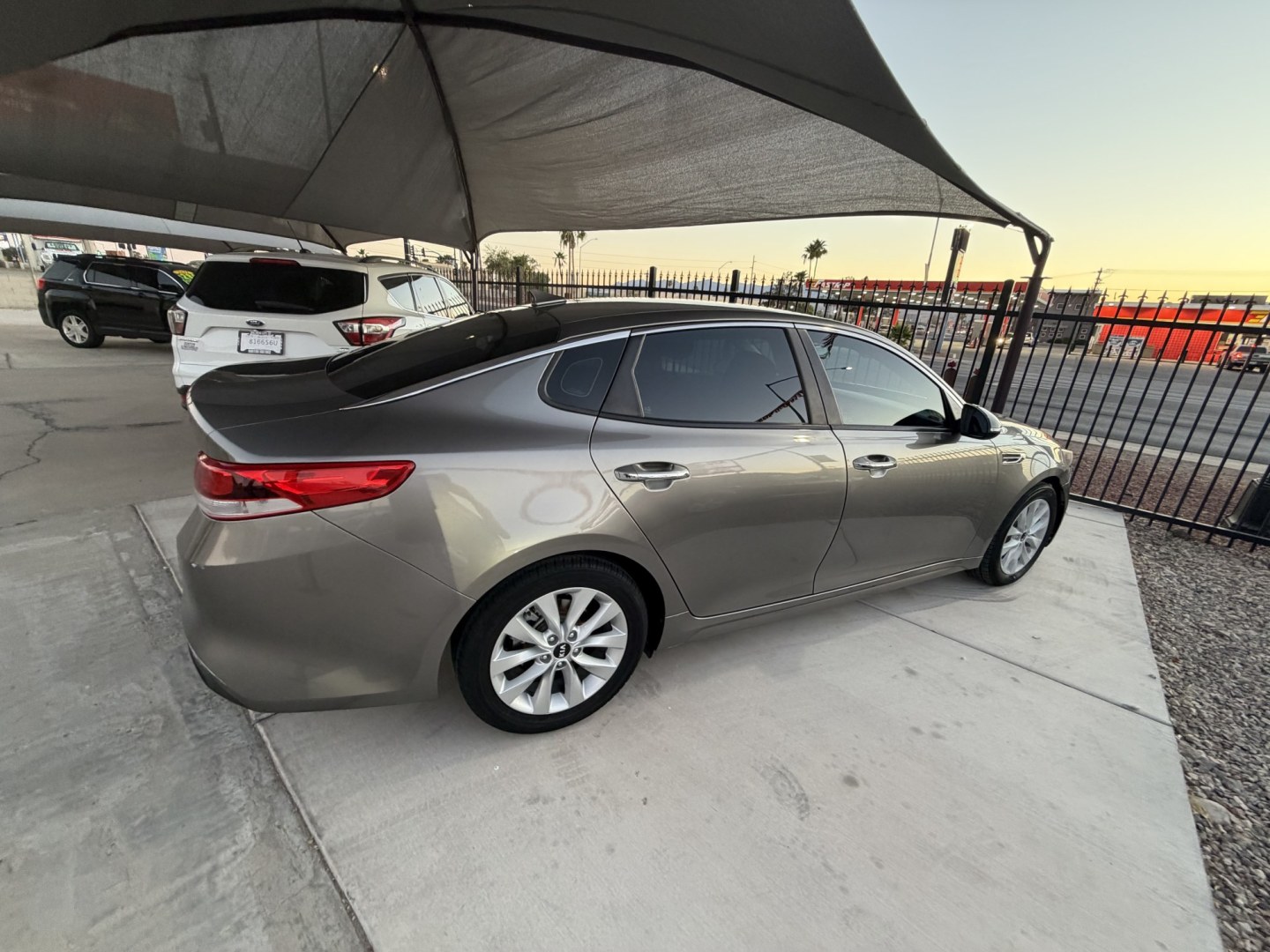 2017 Gold Kia Optima LX (5XXGT4L31HG) with an 2.4L L4 DOHC 16V engine, 6A transmission, located at 2190 Hwy 95, Bullhead City, AZ, 86442, (928) 704-0060, 0.000000, 0.000000- Photo#5