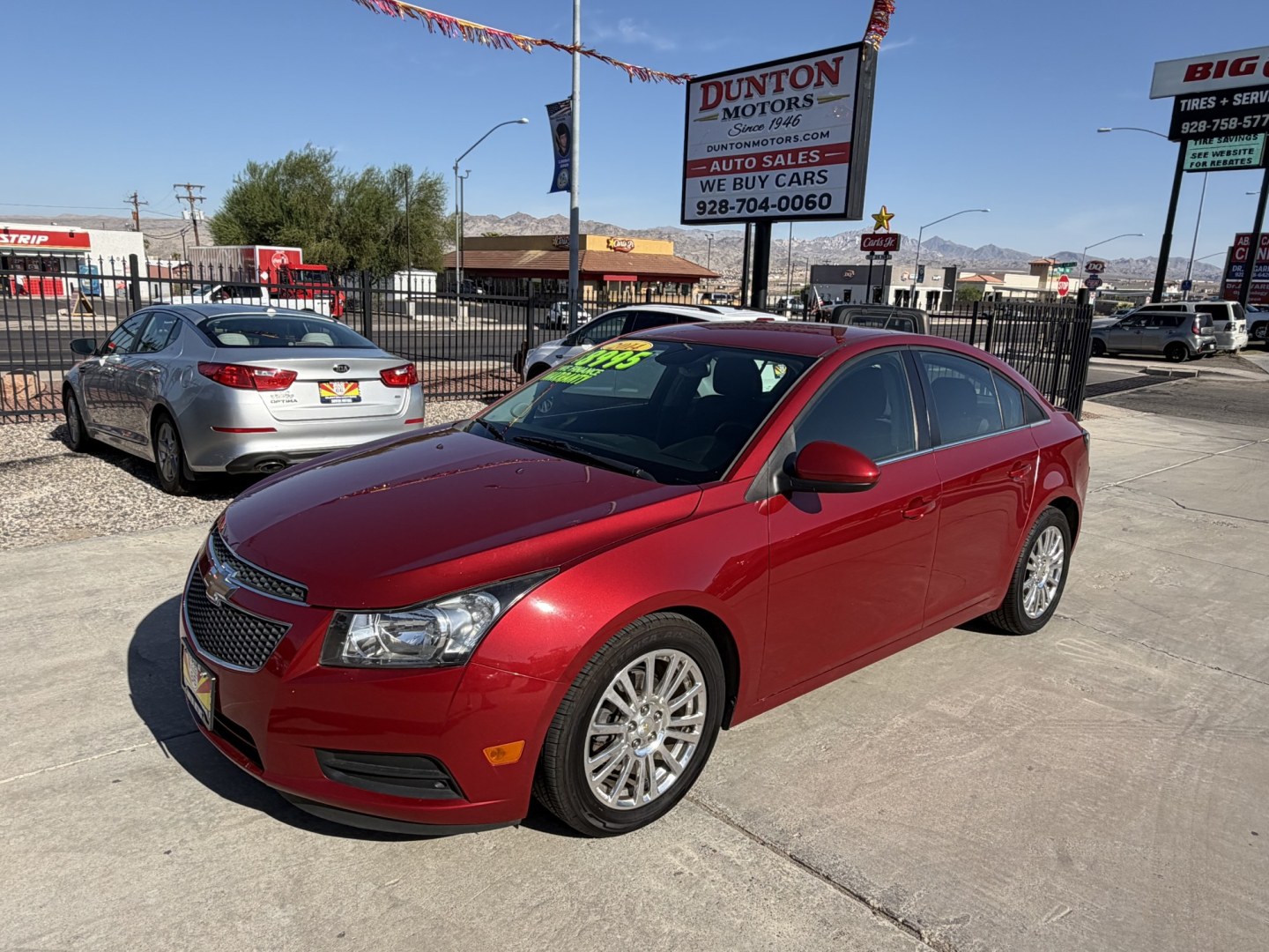 2014 ruby red Chevrolet Cruze ECO Manual (1G1PJ5SB1E7) with an 1.4L L4 DOHC 16V TURBO engine, 6-Speed Manual transmission, located at 2190 Hwy 95, Bullhead City, AZ, 86442, (928) 704-0060, 0.000000, 0.000000- Photo#2