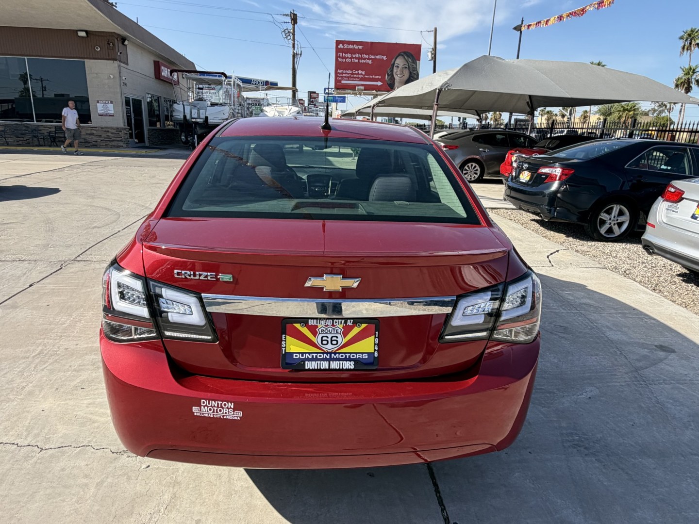 2014 ruby red Chevrolet Cruze ECO Manual (1G1PJ5SB1E7) with an 1.4L L4 DOHC 16V TURBO engine, 6-Speed Manual transmission, located at 2190 Hwy 95, Bullhead City, AZ, 86442, (928) 704-0060, 0.000000, 0.000000- Photo#3