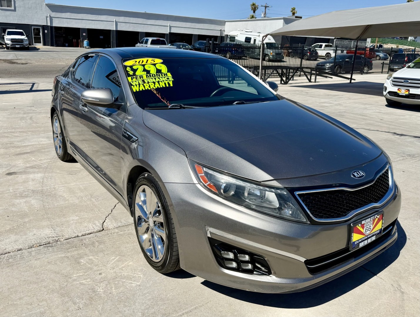 2015 Gold Kia Optima SX Turbo (5XXGR4A63FG) with an 2.0L L4 DOHC 16V TURBO engine, 6A transmission, located at 2190 Hwy 95, Bullhead City, AZ, 86442, (928) 704-0060, 0.000000, 0.000000- Photo#0