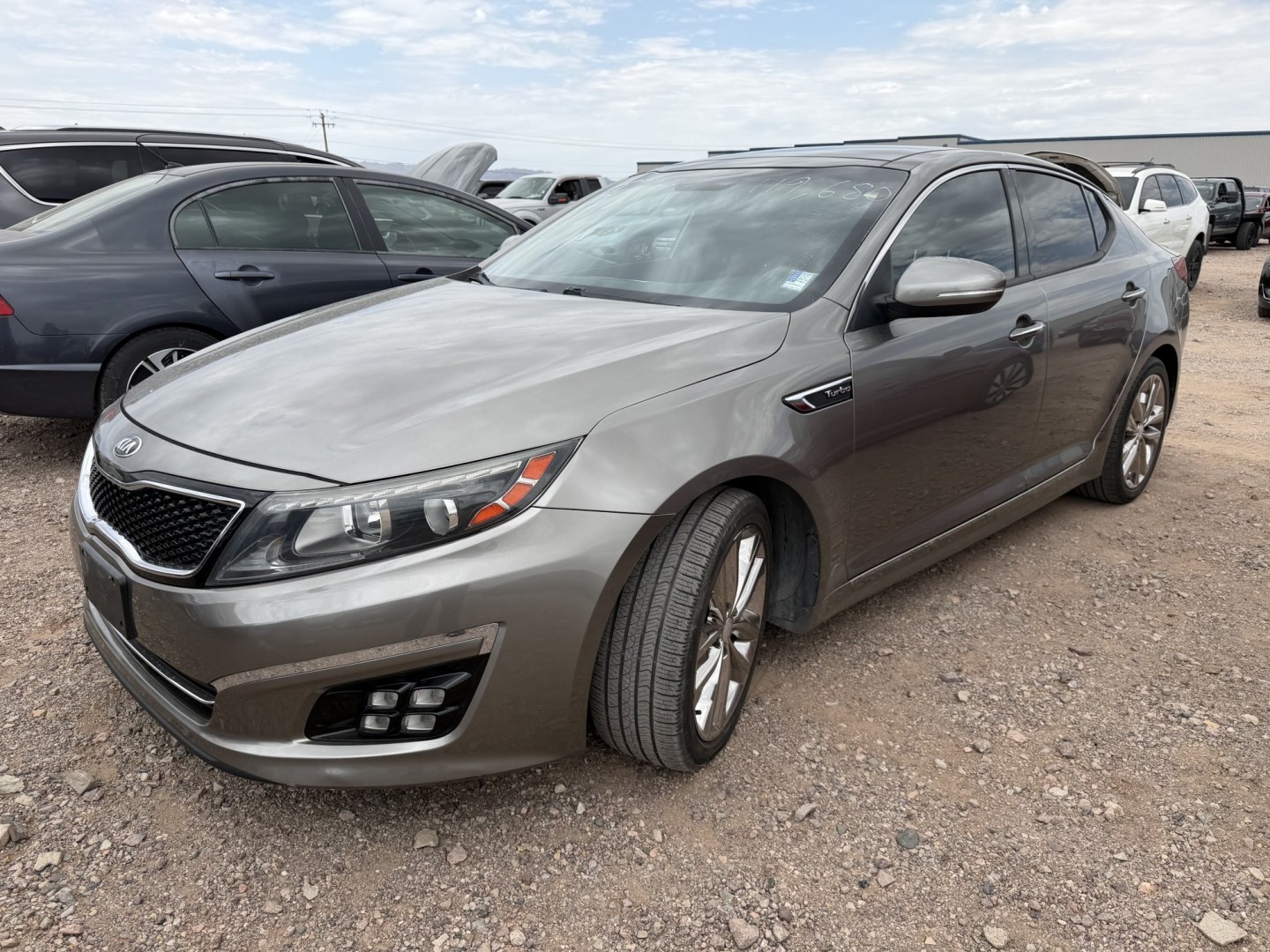 2015 Gold Kia Optima SX Turbo (5XXGR4A63FG) with an 2.0L L4 DOHC 16V TURBO engine, 6A transmission, located at 2190 Hwy 95, Bullhead City, AZ, 86442, (928) 704-0060, 0.000000, 0.000000- Photo#0