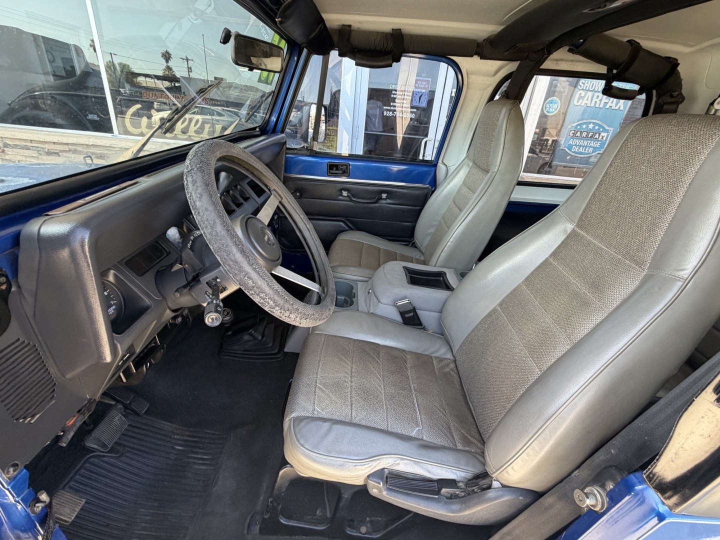 1995 Jeep Wrangler SE (1J4FY29S9SP) with an 4.0L L6 OHV 12V engine, located at 2190 Hwy 95, Bullhead City, AZ, 86442, (928) 704-0060, 0.000000, 0.000000 - 1995 jeep wrangler 6 cylinder automatic transmission 4 wheel drive. hard top with air conditioning. swing away spare tire carrier. hard top, hard doors. great running jeep. new shocks all the way around. brake pads, completely serviced. free carfax, free warranty. IN house financing available.- Photo#14