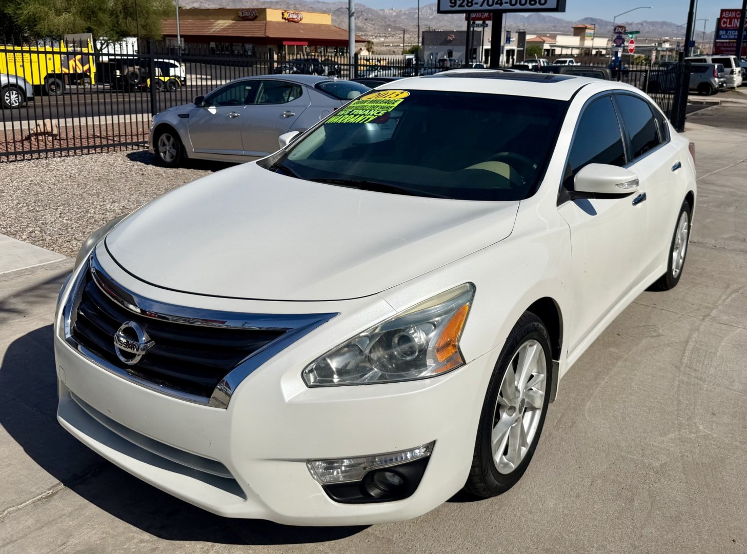 2013 White Nissan Altima 2.5 S (1N4AL3AP4DN) with an 2.5L L4 DOHC 16V engine, located at 2190 Hwy 95, Bullhead City, AZ, 86442, (928) 704-0060, 0.000000, 0.000000- Photo#2