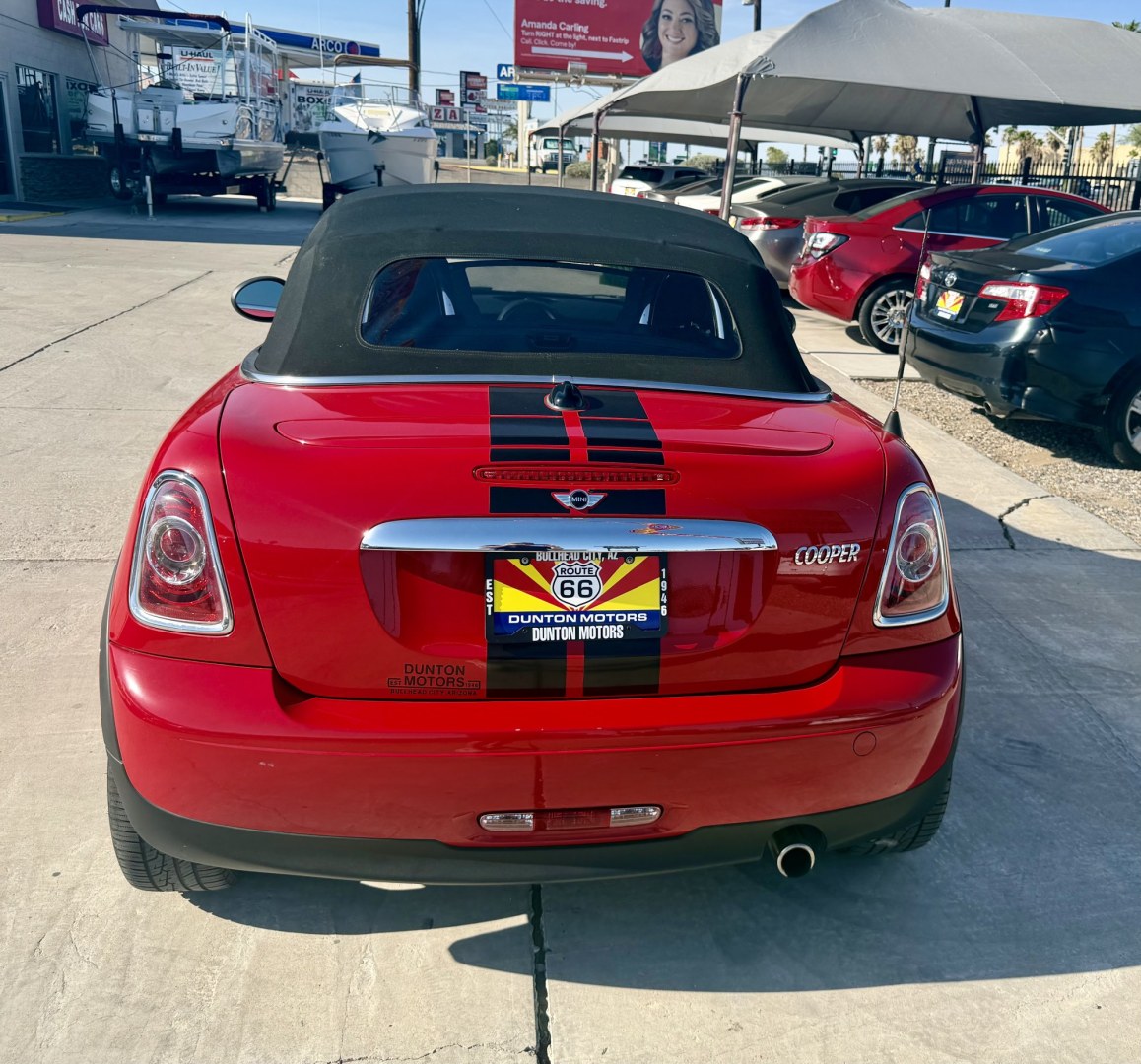2013 ruby red Mini Cooper Base (WMWSY1C57DT) with an 1.6L L4 DOHC 16V TURBO engine, located at 2190 Hwy 95, Bullhead City, AZ, 86442, (928) 704-0060, 0.000000, 0.000000 - automatic convertible. great running cool car.- Photo#2