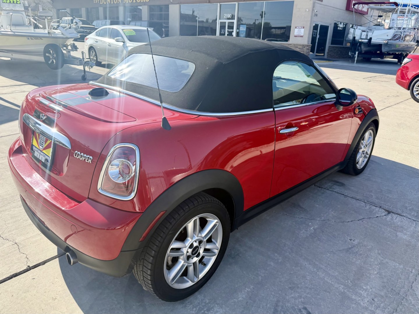 2013 ruby red Mini Cooper Base (WMWSY1C57DT) with an 1.6L L4 DOHC 16V TURBO engine, located at 2190 Hwy 95, Bullhead City, AZ, 86442, (928) 704-0060, 0.000000, 0.000000 - automatic convertible. great running cool car.- Photo#5