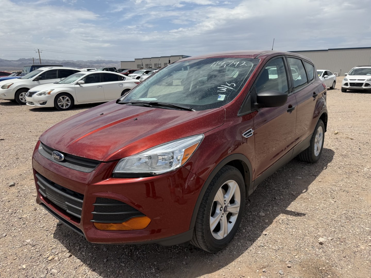 2014 Red Ford Escape S FWD (1FMCU0F7XEU) with an 2.5L L4 DOHC 16V engine, 6-Speed Automatic transmission, located at 2190 Hwy 95, Bullhead City, AZ, 86442, (928) 704-0060, 0.000000, 0.000000- Photo#1