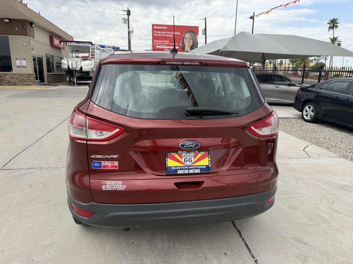 2014 Red Ford Escape S FWD (1FMCU0F7XEU) with an 2.5L L4 DOHC 16V engine, 6-Speed Automatic transmission, located at 2190 Hwy 95, Bullhead City, AZ, 86442, (928) 704-0060, 0.000000, 0.000000- Photo#2