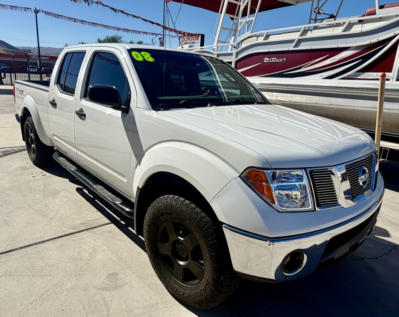 2008 White , located at 2190 Hwy 95, Bullhead City, AZ, 86442, (928) 704-0060, 0.000000, 0.000000 - 2008 Nissan Frontier Crew cab 4x4.SE V6 pro 4Xoff road package. automatic . toyo all terrain off road tires. custom running boards. new headlights. recently serviced. ice cold a/c. small body lift with off road tires/wheels. bedliner tow package. always garaged. elderly owned. This truck looks new.- Photo#0