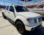 2008 White , located at 2190 Hwy 95, Bullhead City, AZ, 86442, (928) 704-0060, 0.000000, 0.000000 - 2008 Nissan Frontier Crew cab 4x4.SE V6 pro 4Xoff road package. automatic . toyo all terrain off road tires. custom running boards. new headlights. recently serviced. ice cold a/c. small body lift with off road tires/wheels. bedliner tow package. always garaged. elderly owned. This truck looks new.- Photo#0