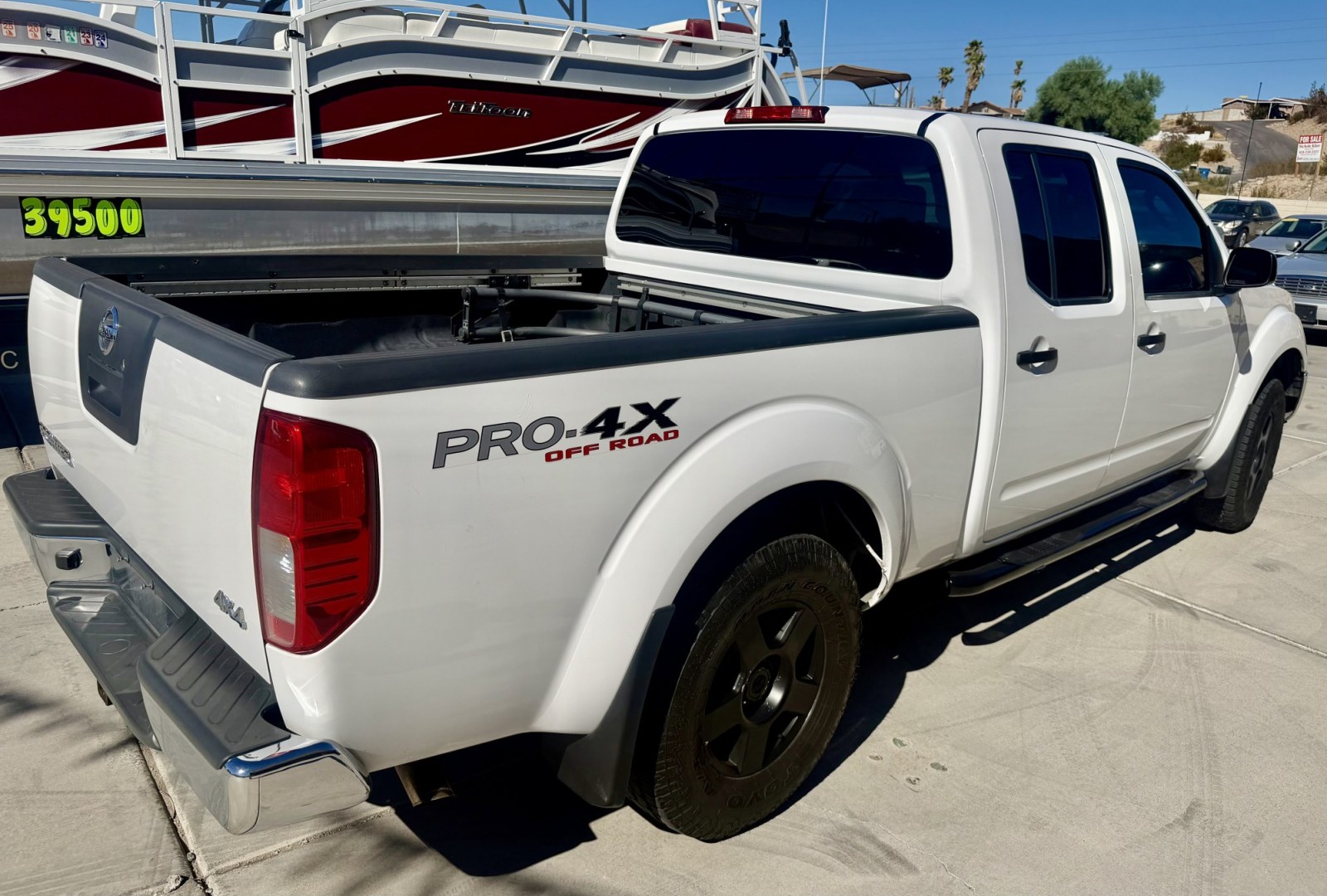 2008 White , located at 2190 Hwy 95, Bullhead City, AZ, 86442, (928) 704-0060, 0.000000, 0.000000 - 2008 Nissan Frontier Crew cab 4x4.SE V6 pro 4Xoff road package. automatic . toyo all terrain off road tires. custom running boards. new headlights. recently serviced. ice cold a/c. small body lift with off road tires/wheels. bedliner tow package. always garaged. elderly owned. This truck looks new.- Photo#8