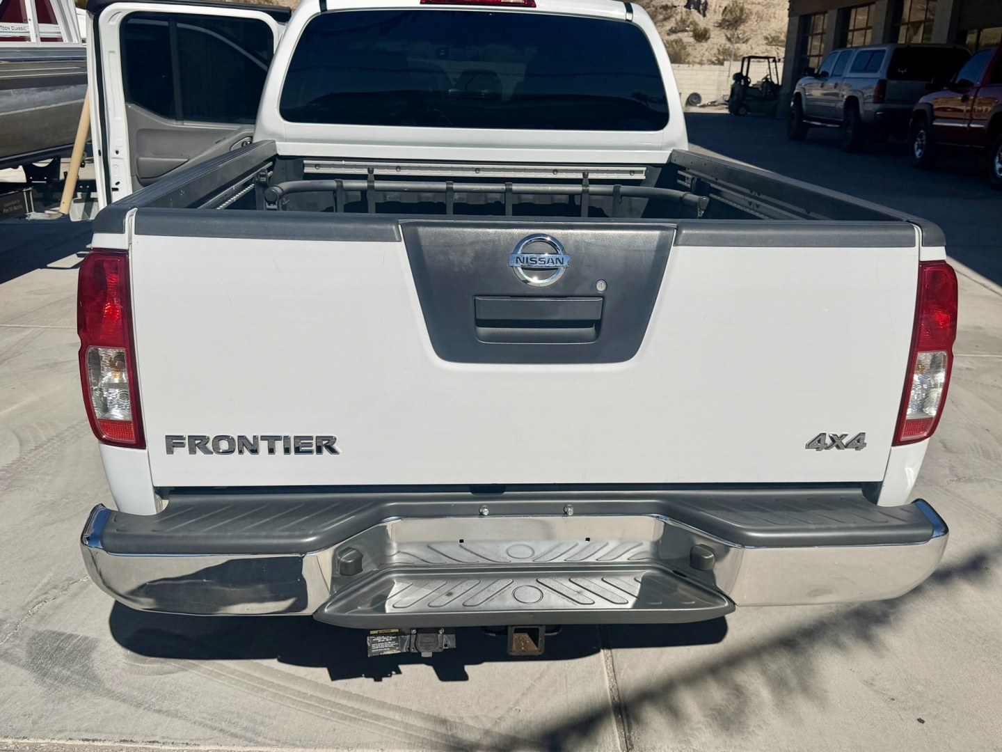 2008 White , located at 2190 Hwy 95, Bullhead City, AZ, 86442, (928) 704-0060, 0.000000, 0.000000 - 2008 Nissan Frontier Crew cab 4x4.SE V6 pro 4Xoff road package. automatic . toyo all terrain off road tires. custom running boards. new headlights. recently serviced. ice cold a/c. small body lift with off road tires/wheels. bedliner tow package. always garaged. elderly owned. This truck looks new.- Photo#10