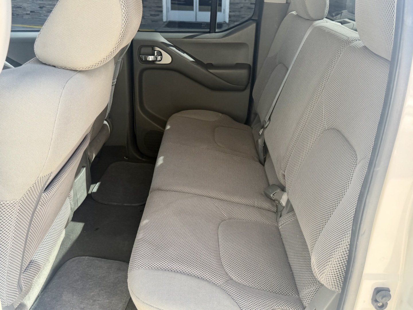 2008 White , located at 2190 Hwy 95, Bullhead City, AZ, 86442, (928) 704-0060, 0.000000, 0.000000 - 2008 Nissan Frontier Crew cab 4x4.SE V6 pro 4Xoff road package. automatic . toyo all terrain off road tires. custom running boards. new headlights. recently serviced. ice cold a/c. small body lift with off road tires/wheels. bedliner tow package. always garaged. elderly owned. This truck looks new.- Photo#13