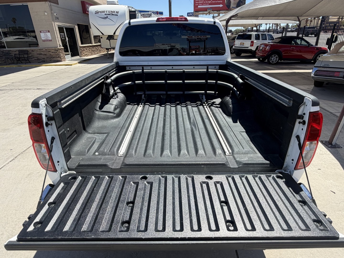 2008 White , located at 2190 Hwy 95, Bullhead City, AZ, 86442, (928) 704-0060, 0.000000, 0.000000 - 2008 Nissan Frontier Crew cab 4x4.SE V6 pro 4Xoff road package. automatic . toyo all terrain off road tires. custom running boards. new headlights. recently serviced. ice cold a/c. small body lift with off road tires/wheels. bedliner tow package. always garaged. elderly owned. This truck looks new.- Photo#16