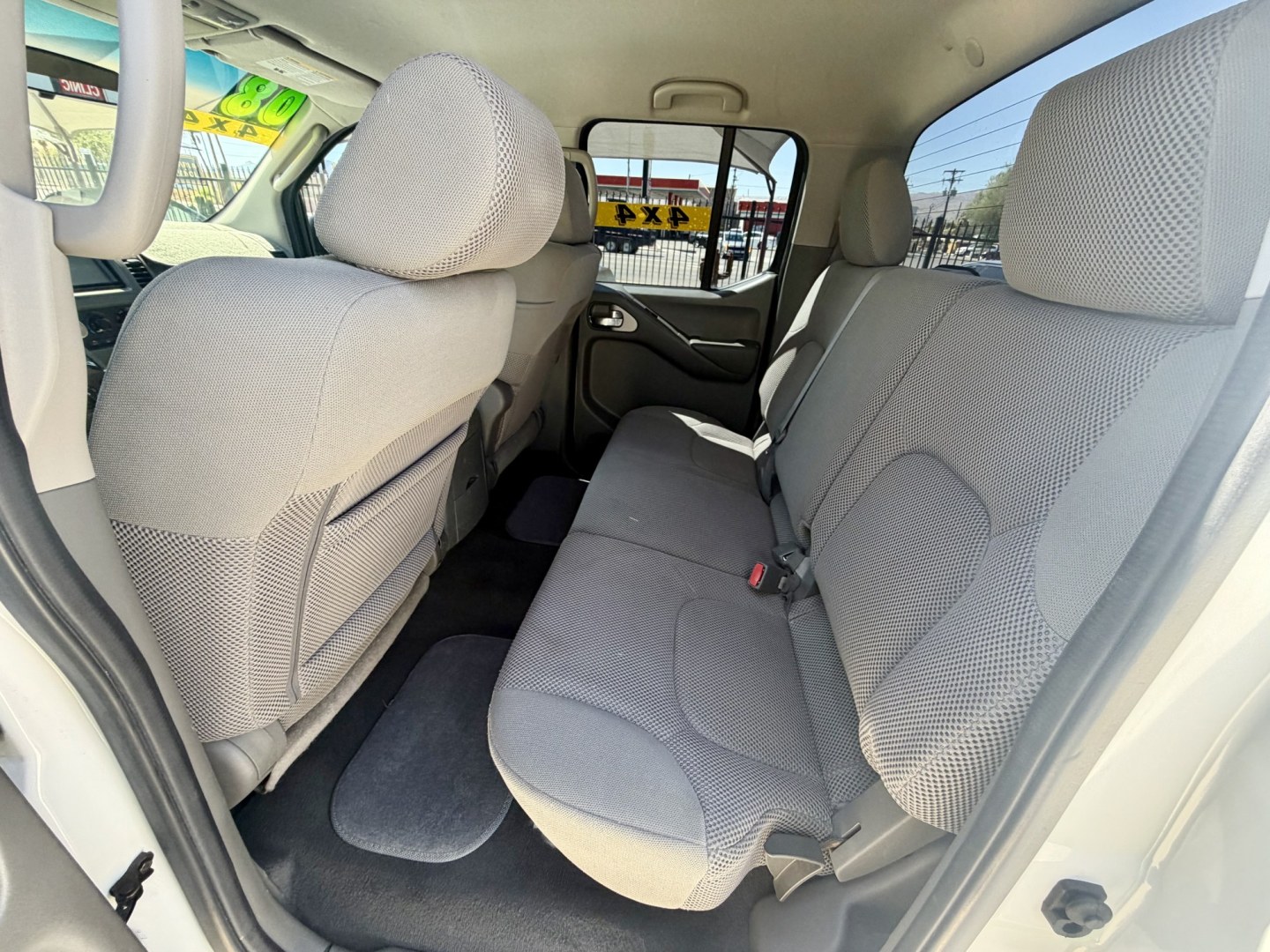 2008 White , located at 2190 Hwy 95, Bullhead City, AZ, 86442, (928) 704-0060, 0.000000, 0.000000 - 2008 Nissan Frontier Crew cab 4x4.SE V6 pro 4Xoff road package. automatic . toyo all terrain off road tires. custom running boards. new headlights. recently serviced. ice cold a/c. small body lift with off road tires/wheels. bedliner tow package. always garaged. elderly owned. This truck looks new.- Photo#18