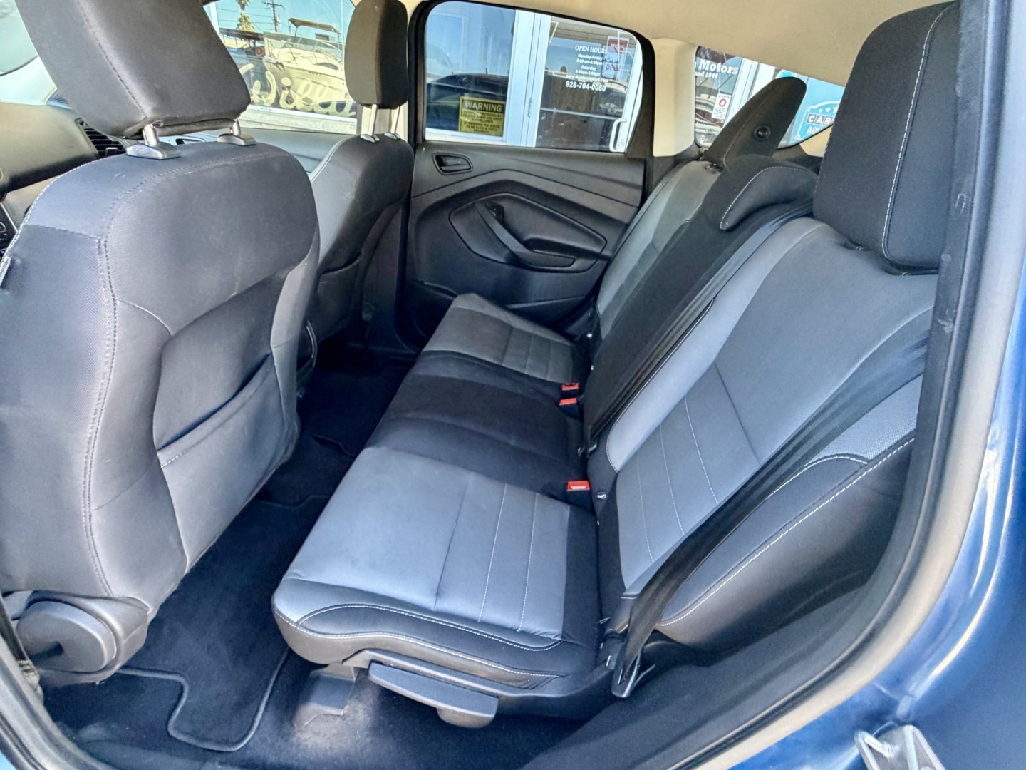 2018 Blue Ford Escape S FWD (1FMCU0F73JU) with an 2.5L L4 DOHC 16V engine, 6A transmission, located at 2190 Hwy 95, Bullhead City, AZ, 86442, (928) 704-0060, 0.000000, 0.000000 - 1 owner arizona car. free carfax.- Photo#7