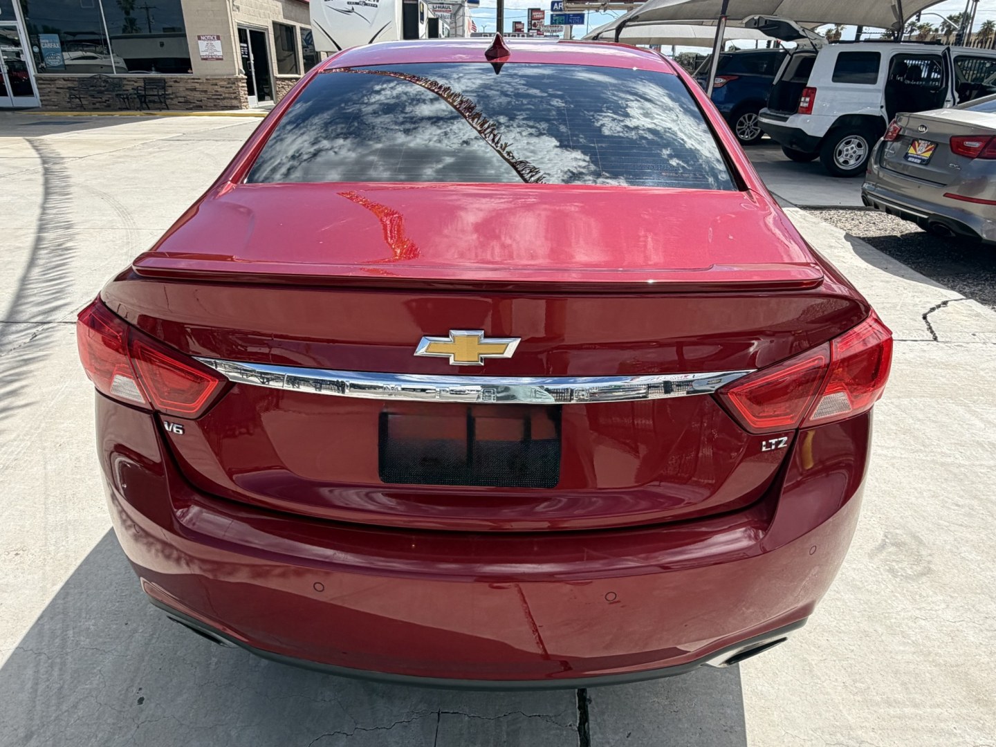 2015 Burgundy Chevrolet Impala ltz , located at 2190 Hwy 95, Bullhead City, AZ, 86442, (928) 704-0060, 0.000000, 0.000000 - 2015 Chevrolet impala LTZ. 1 family has owned since new . 3,5 v6 leather loaded custom wheels super. Bluetooth , backup camera . Az title- Photo#6