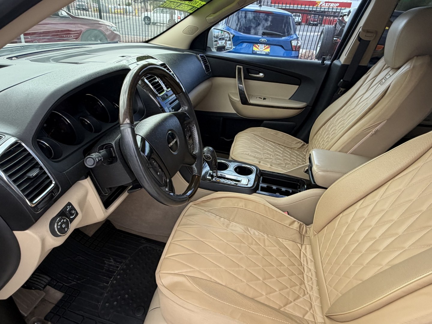 2012 White GMC Acadia Denali FWD (1GKKRTED4CJ) with an 3.6L V6 DOHC 24V engine, 6A transmission, located at 2190 Hwy 95, Bullhead City, AZ, 86442, (928) 704-0060, 0.000000, 0.000000 - 2012 GMC Acadia Denali. fully loaded .3rd row leatherk moonroof, backup camera, bluetooth, dual rear tv's with dvd player. michelin tires. completely serviced. In house financing available. loaded we finance. Free carfax, free warranty.- Photo#7