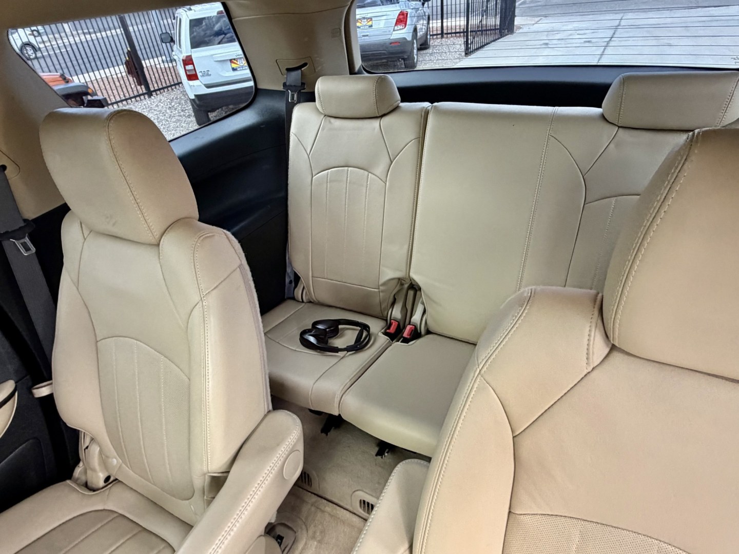 2012 White GMC Acadia Denali FWD (1GKKRTED4CJ) with an 3.6L V6 DOHC 24V engine, 6A transmission, located at 2190 Hwy 95, Bullhead City, AZ, 86442, (928) 704-0060, 0.000000, 0.000000 - 2012 GMC Acadia Denali. fully loaded .3rd row leatherk moonroof, backup camera, bluetooth, dual rear tv's with dvd player. michelin tires. completely serviced. In house financing available. loaded we finance. Free carfax, free warranty.- Photo#8