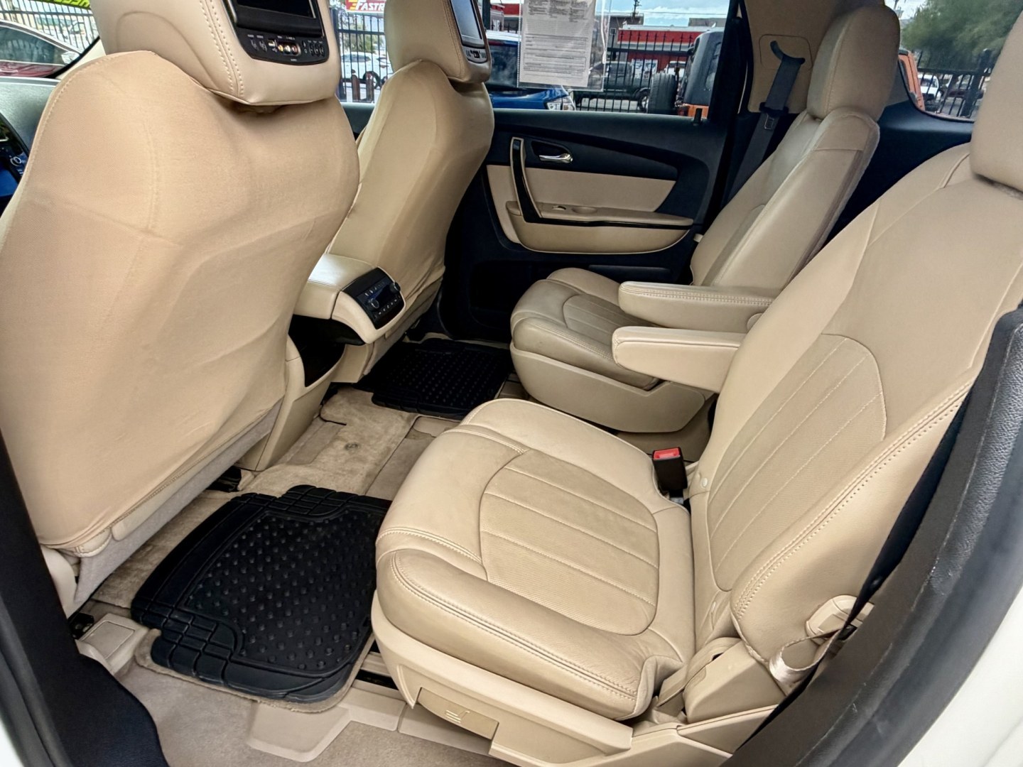 2012 White GMC Acadia Denali FWD (1GKKRTED4CJ) with an 3.6L V6 DOHC 24V engine, 6A transmission, located at 2190 Hwy 95, Bullhead City, AZ, 86442, (928) 704-0060, 0.000000, 0.000000 - 2012 GMC Acadia Denali. fully loaded .3rd row leatherk moonroof, backup camera, bluetooth, dual rear tv's with dvd player. michelin tires. completely serviced. In house financing available. loaded we finance. Free carfax, free warranty.- Photo#11