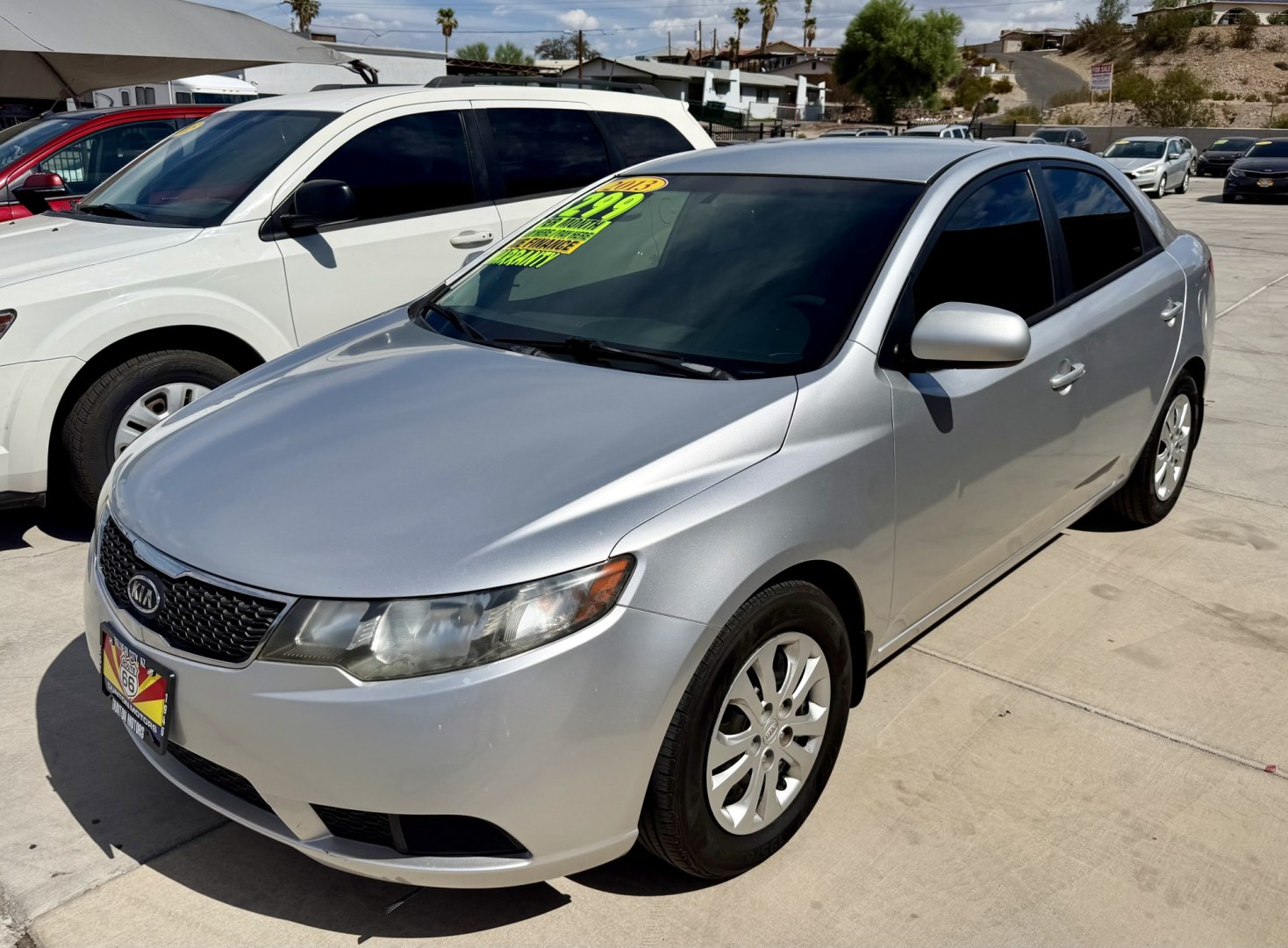 2013 White Kia Forte LX (KNAFT4A21D5) with an 2.0L L4 DOHC 16V engine, located at 2190 Hwy 95, Bullhead City, AZ, 86442, (928) 704-0060, 0.000000, 0.000000 - Clean carfax no accidents 84k miles automatic. Free warranty. We finance.- Photo#1