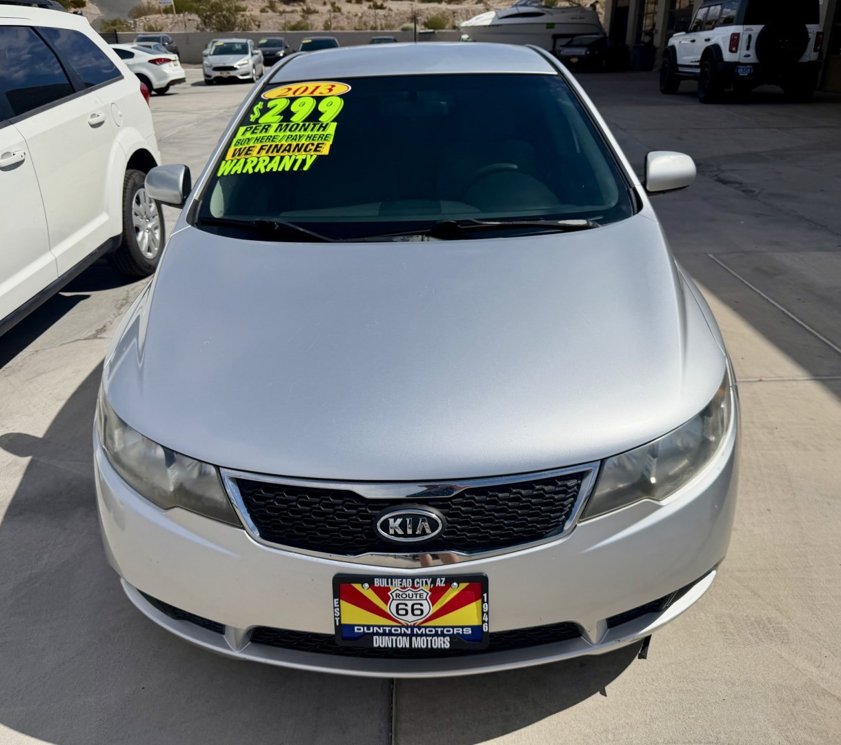 2013 White Kia Forte LX (KNAFT4A21D5) with an 2.0L L4 DOHC 16V engine, located at 2190 Hwy 95, Bullhead City, AZ, 86442, (928) 704-0060, 0.000000, 0.000000 - Clean carfax no accidents 84k miles automatic. Free warranty. We finance.- Photo#2