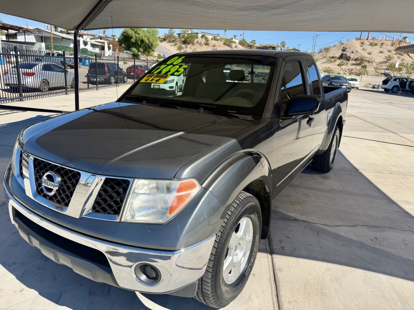 2006 Bronze Nissan Frontier LE King Cab 4WD (1N6AD06W46C) with an 4.0L V6 DOHC 24V engine, 5A OD transmission, located at 2190 Hwy 95, Bullhead City, AZ, 86442, (928) 704-0060, 0.000000, 0.000000 - 2006 Nissan frontier king cab automatic 4x4 . * 1 owner since it was brand new. Arizona truck. has extensive service records. no accidentsy. 4 wheel drive. Always maintened. elderly owned. 4.0 V6. cold ac. power windows locks, tow package. great running truck.- Photo#2