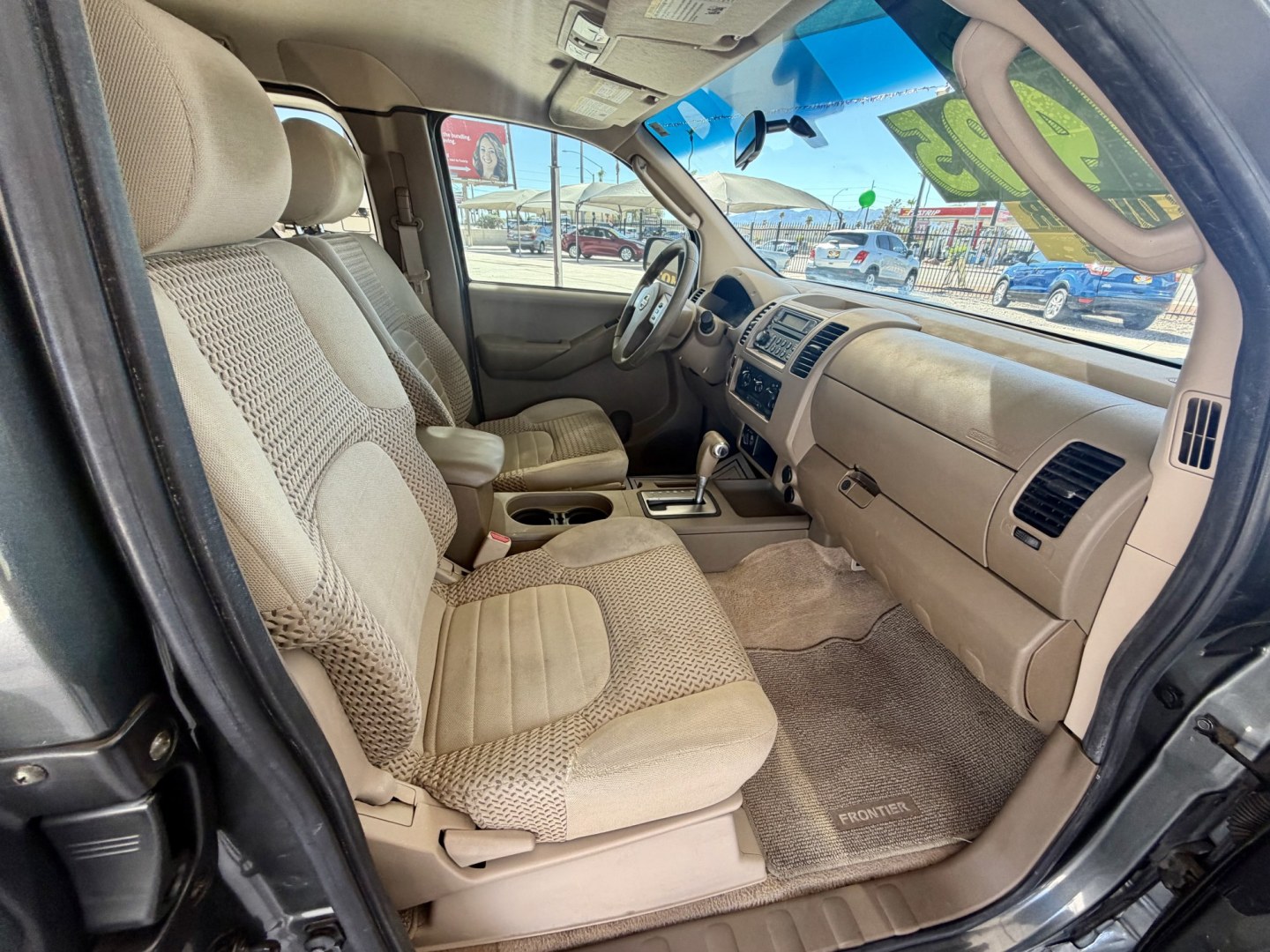2006 Bronze Nissan Frontier LE King Cab 4WD (1N6AD06W46C) with an 4.0L V6 DOHC 24V engine, 5A OD transmission, located at 2190 Hwy 95, Bullhead City, AZ, 86442, (928) 704-0060, 0.000000, 0.000000 - 2006 Nissan frontier king cab automatic 4x4 . * 1 owner since it was brand new. Arizona truck. has extensive service records. no accidentsy. 4 wheel drive. Always maintened. elderly owned. 4.0 V6. cold ac. power windows locks, tow package. great running truck.- Photo#5