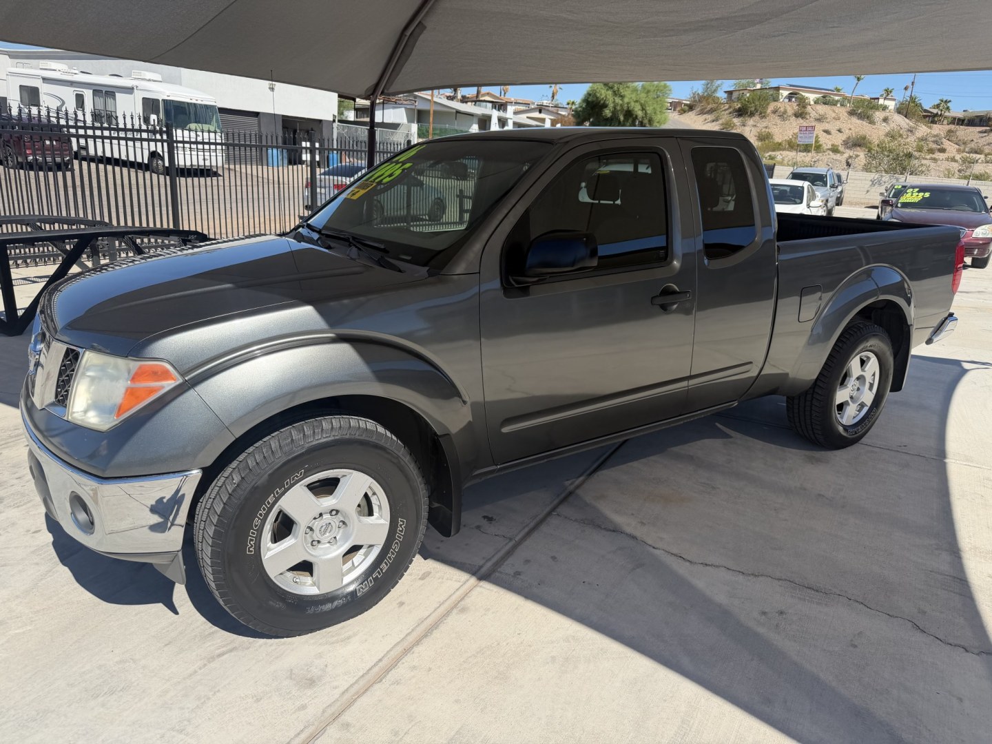 2006 Bronze Nissan Frontier LE King Cab 4WD (1N6AD06W46C) with an 4.0L V6 DOHC 24V engine, 5A OD transmission, located at 2190 Hwy 95, Bullhead City, AZ, 86442, (928) 704-0060, 0.000000, 0.000000 - 2006 Nissan frontier king cab automatic 4x4 . * 1 owner since it was brand new. Arizona truck. has extensive service records. no accidentsy. 4 wheel drive. Always maintened. elderly owned. 4.0 V6. cold ac. power windows locks, tow package. great running truck.- Photo#3