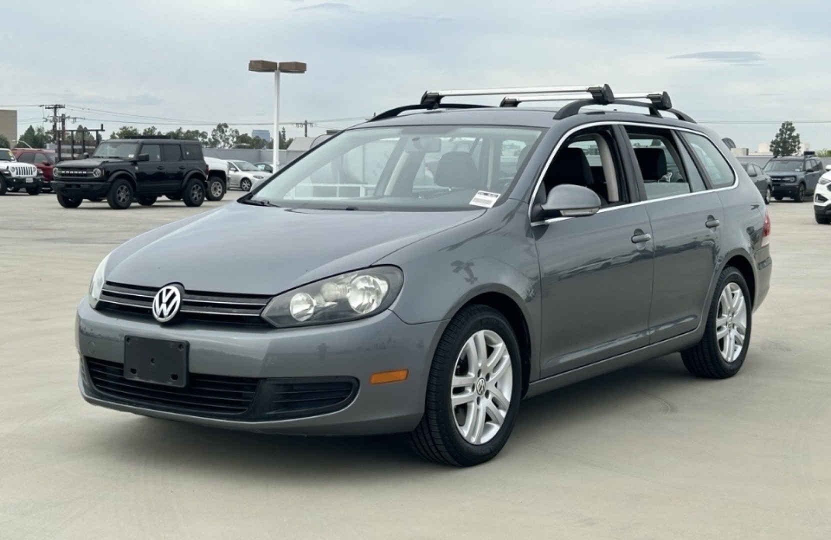 2013 Charcoal Volkswagen Jetta SportWagen 2.0L TDI (3VWPL7AJ5DM) with an 2.0L L4 SOHC 16V TURBO DIESEL engine, located at 2190 Hwy 95, Bullhead City, AZ, 86442, (928) 704-0060, 0.000000, 0.000000 - 1 owner clean CARFAX .- Photo#0
