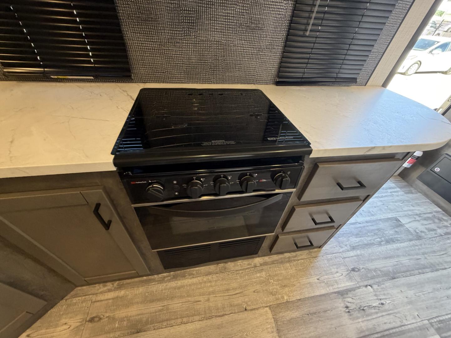 2021 White Heartland North Trail Ultra Lite (5AFNB2621MN) , located at 2190 Hwy 95, Bullhead City, AZ, 86442, (928) 704-0060, 0.000000, 0.000000 - 2021 Heartland North trail boss. 26.6 ft long. power awning. rear bathroom . sleeps 4 . king size bed. brand new batteries. electric tongue jack. fully equipped kitchen power slide out. heated and enclosed under belly. outside shower. large pass through storage. power awning with led lighthing. sol- Photo#16